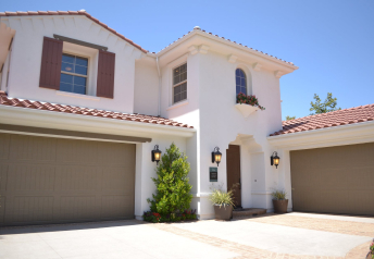 A picture of house with a front yard